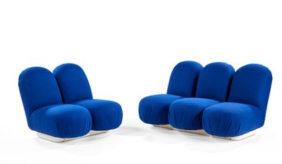 pair of lounge chairs with blue upholstered cushions on white background
