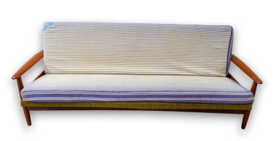 a couch that has a mattress on top of it