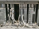 a bunch of wires that are connected to a switchboard