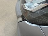a close up of a car ' s headlight and tail light