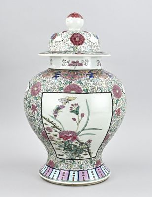 an image of a vase with a lid and flowers on it