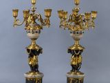 pair of antique bronze and black marble candelabs
