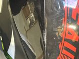 a close up of a motorcycle with a helmet on
