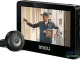 an image of a picture of a man holding a box and a camera