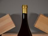 a bottle of wine that is sitting on a table