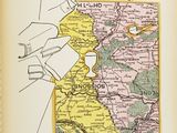 an old book with a drawing of a man and a woman on a map