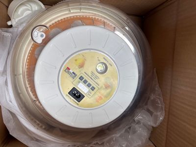 a box that has a clock inside of it