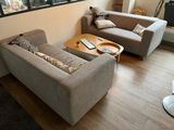 two couches and a coffee table in a living room
