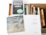 a box full of books on a table with a book in it