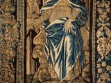 an image of a tapestry with a picture of a woman on it