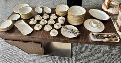 a table with a lot of plates and bowls on it