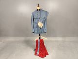 an image of a suit and tie on a mannequin stand