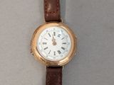 a watch that is sitting on top of a table