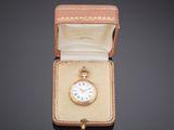 a small box that has a watch inside of it