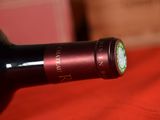 a bottle of wine that is sitting on a table