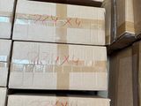 several boxes stacked on top of each other in a room