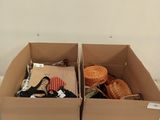 two cardboard boxes that are sitting on a pallet