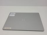 the surface of the surface is white and has a silver surface on it