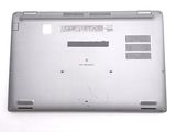 a laptop that has a broken battery on the back of it