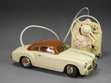 a toy car that is connected to a wall clock
