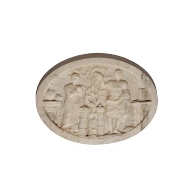 Plaque ovale en marbre sculpté représentant Adam et Eve, dan…