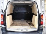 a white van with the back door open and the back door open