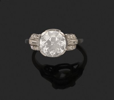 a diamond single - stone ring,