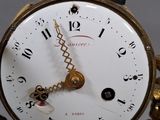 a clock that is hanging on the wall in the room