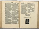 an open book with a black and white image of a cross on it