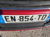 a close up of a license plate on a car