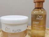 a bottle of lotion and a container of lotion sitting on a table