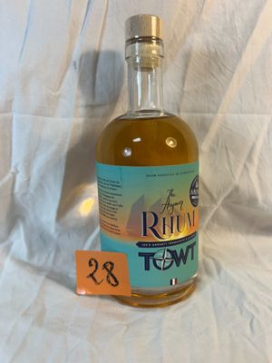 a bottle of rum in front of a white background