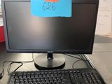 une image d'un écran d'ordinateur et d'un clavier sur un bureau