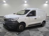 the white van is parked on a checkered floor in a room