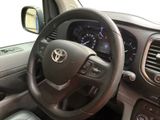 dashboard of a car with a steering wheel and dashboard controls