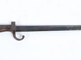 an image of a knife that is on a white surface