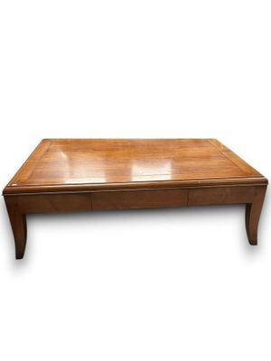 an image of a wooden coffee table on a white background