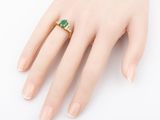 an image of a woman ' s hand with a ring on it ' s finger