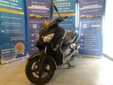 a motorcycle that is parked in a showroom