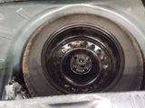 a close up of a car ' s rim and wheel