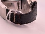 a close up of a wrist watch with a leather band