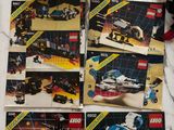 a bunch of legos sitting on top of a table next to each other