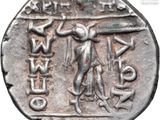 a close up of a coin with an image of a man on it