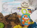 a pile of baby items that are on a table