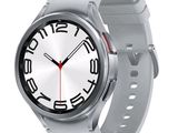 an image of a wrist watch with a white face and a red second hand