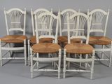 set of six white painted dining chairs with wicker seats