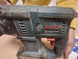 someone is using a cordless drill to cut a piece of wood