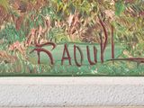 a painting on the wall of a building with a name painted on it