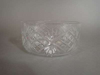 a glass bowl that is sitting on a table
