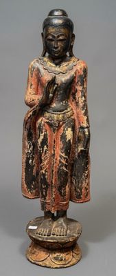 an image of a statue of a person sitting on a pedestal